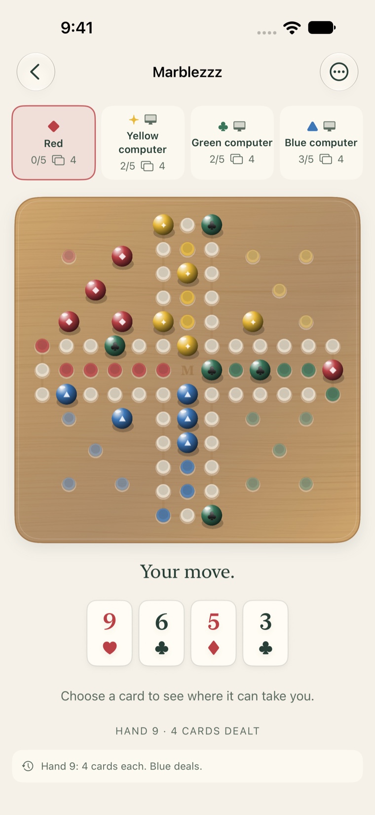 Marblezzz game in progress, with a maple board, four marble colors, and a hand of playing cards.
